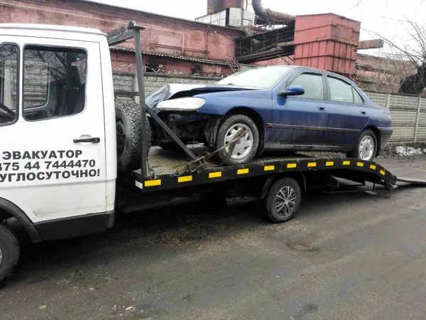 Эвакуатор в Минске аварийный пежо 406
